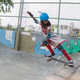 Skater Mini Johnny on one of the concrete bowls. She and other girls from her village were introduced to skateboarding to avoid dropping out of school.